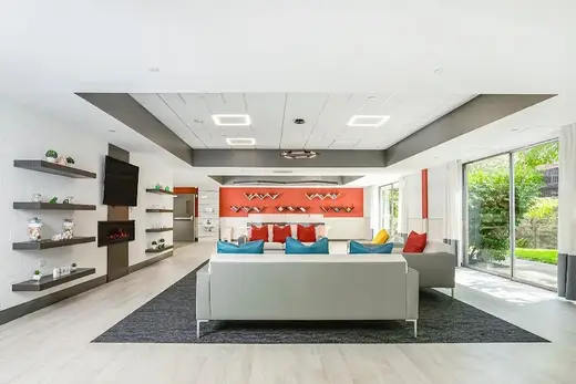 Bright communal lounge area at Glen Island Center for Nursing & Rehabilitation, a treatment center in Bronx.