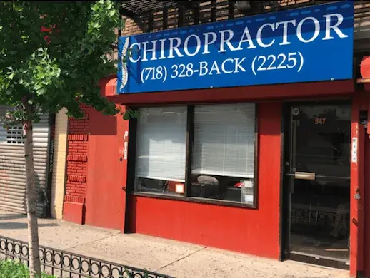 Bright exterior signage of The Rehab Group treatment center in Bronx.
